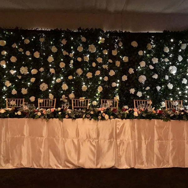 prod-backdrop-greenery-with-white-flowers - Beautiful Wedding Hire